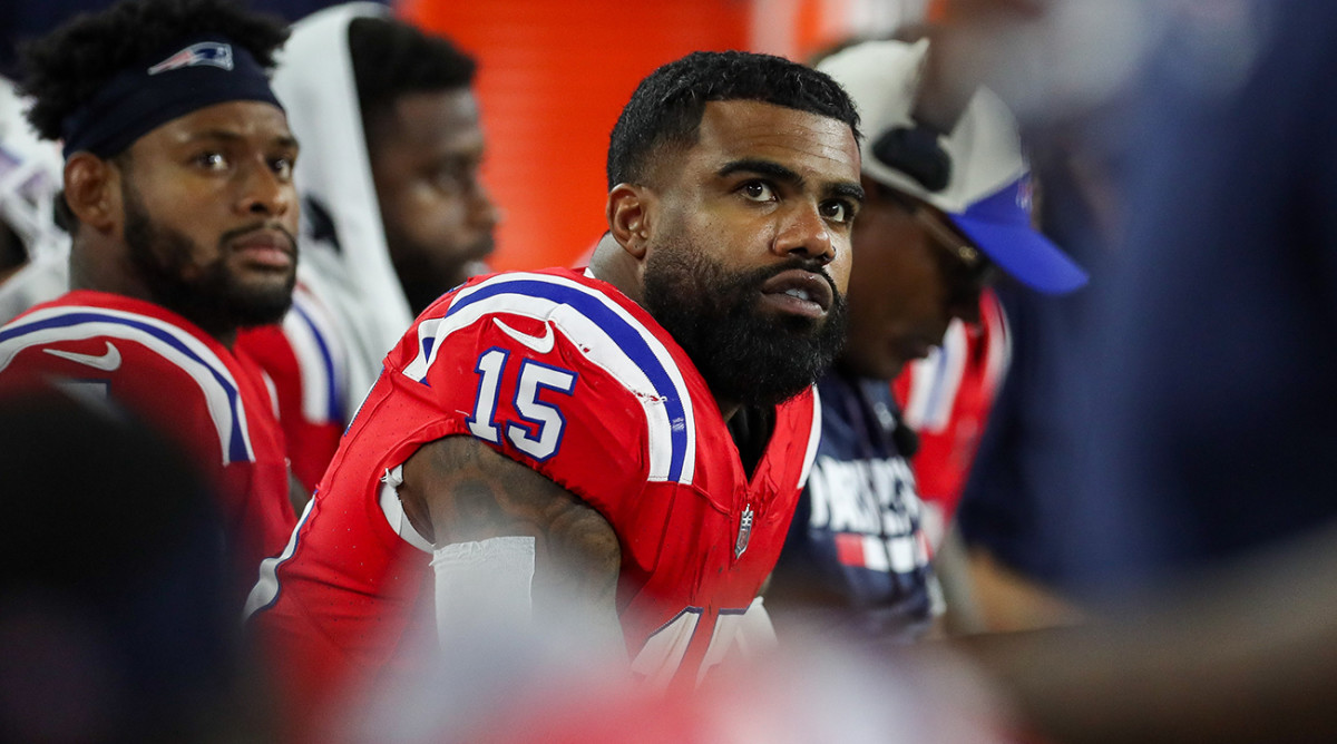 Patriots running back Ezekiel Elliott (15) reacts during the second half against the Dolphins at Gillette Stadium.